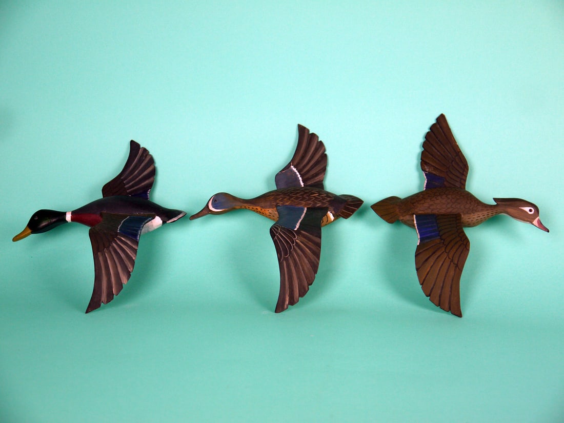 THREE ONE-THIRD SIZE FLYERS, H.V. SHOURDS: THREE FLYING MINIATURE DUCKS by Harry V. Shourds, Seaville, NJ. Excellent original paint and structural condition. The group consists of a wood duck drake, mallard drake and blue wing teal drake. All