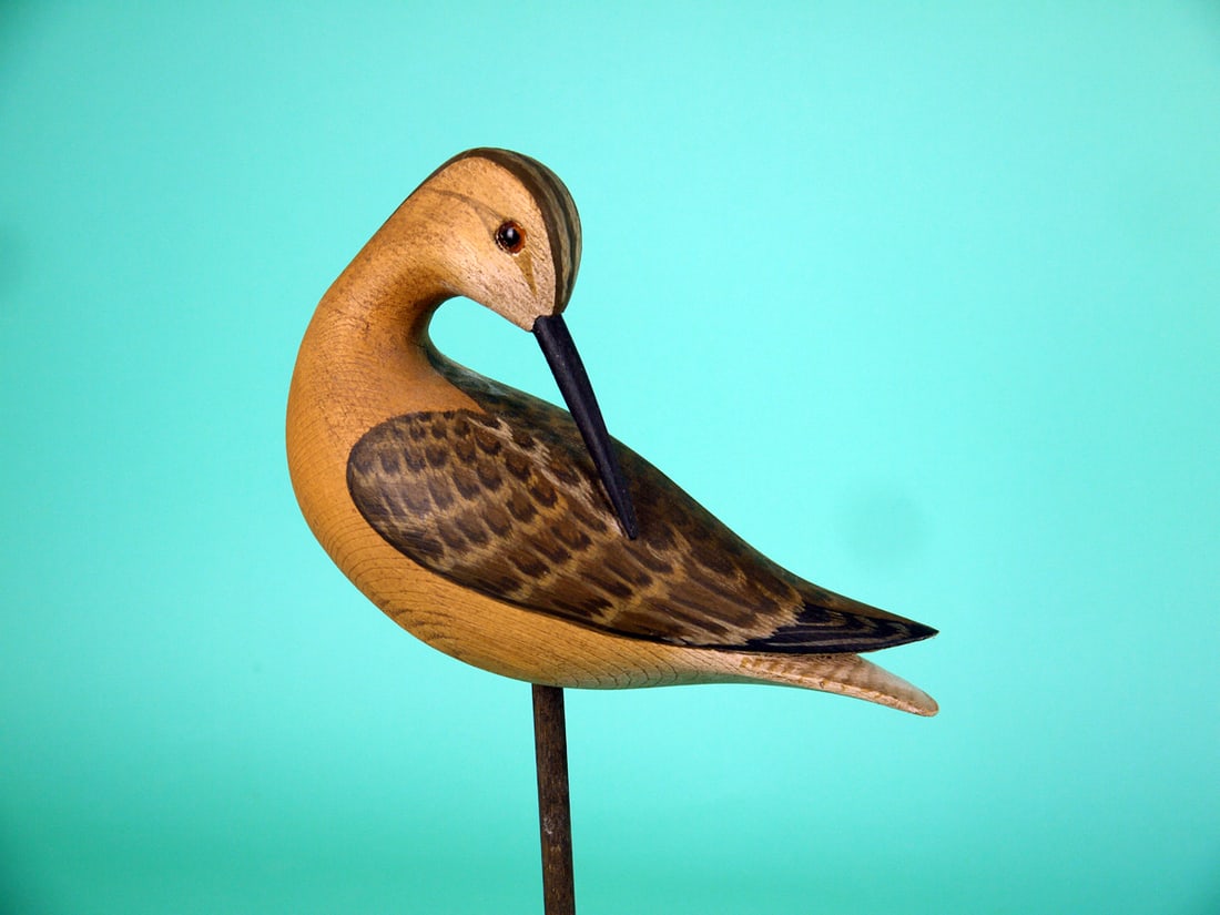 YELLOWLEGS, H.V. SHOURDS: PREENING YELLOWLEGS by Harry V. Shourds, Seaville, NJ. Very good original paint and structural condition. Detailed painted feather work to back and wings. Split-tail carving. Head that rests atop the