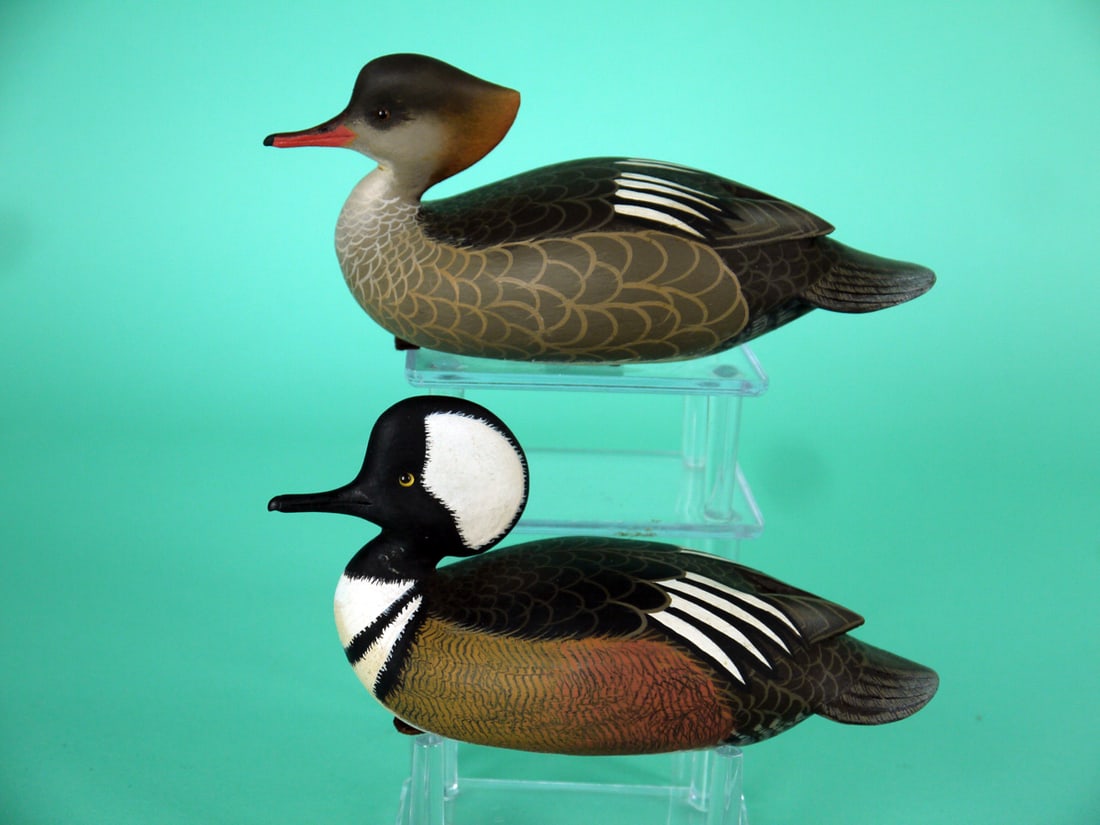 MINIATURE HOODED MERGANSER PAIR, J. WOOD: VERY FINE PAIR OF MINIATURE HOODED MERGANSERS by John Wood, Venice, FL. Excellent original paint and structural condition. Both with detailed painted feather work to back and sides. Both with raised w