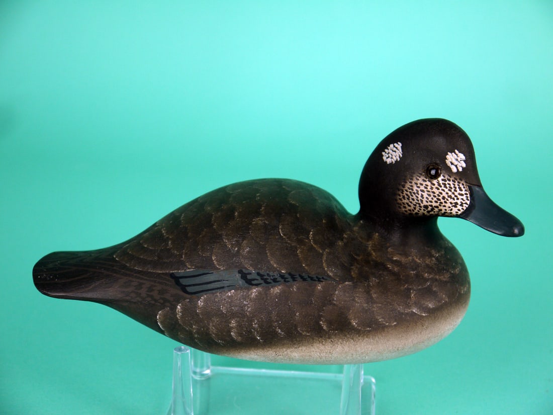 ONE-THIRD SIZE HARLEQUIN HEN, W. CRANMER: ONE-THIRD SIZE HARLEQUIN HEN by William Cranmer, Beach Haven, NJ. Excellent original paint and structural condition. Detailed painted feather work to back and face. Slightly turned head retains glass
