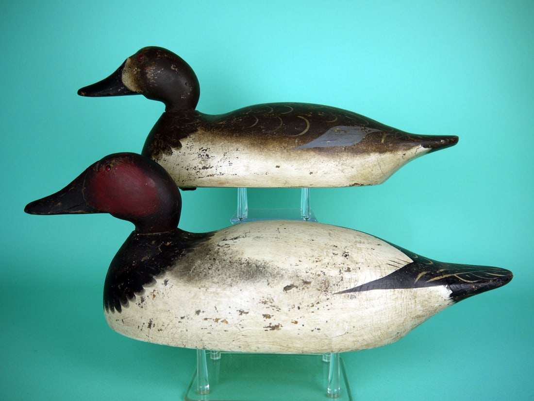 CANVASBACK PAIR, MASON: MAGNUM CANVASBACK PAIR by the Mason Decoy Factory, Detroit, MI. Very good restored paint in the Mason style with gunning wear. Very good structural condition. Both with tight check to underside of