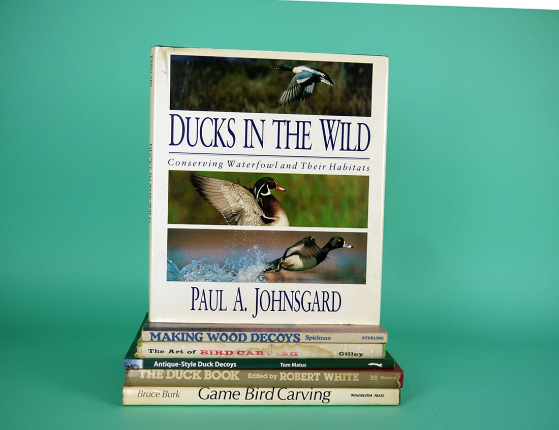 SIX DECOY BOOKS: SIX BOOKS consisting of "Ducks in the Wind" by P. Johnsgard, "Game Bird Carving" by B. Burk, "Making Wood Decoys" by P. Speilman, "Antique Style Duck Decoys" by T. Matus, "The Art of Bird Carving" by 