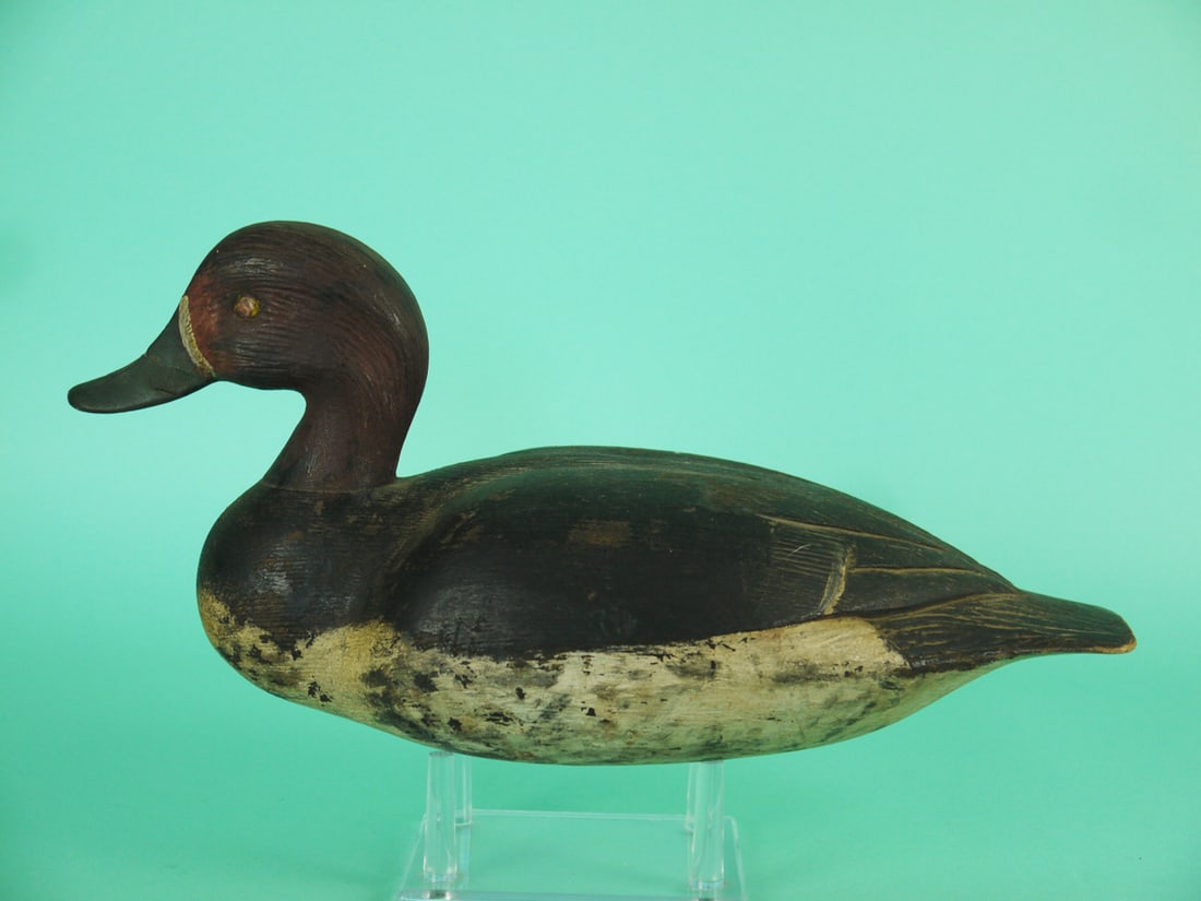 REDHEAD DRAKE, P. LACOMBE: REDHEAD DRAKE by Paul Emile Lacombe, Louisville, Quebec. Working paint and good structural condition. Tight neck crack and repair to bill crack. Carved wing separation, and relief-carved detail to