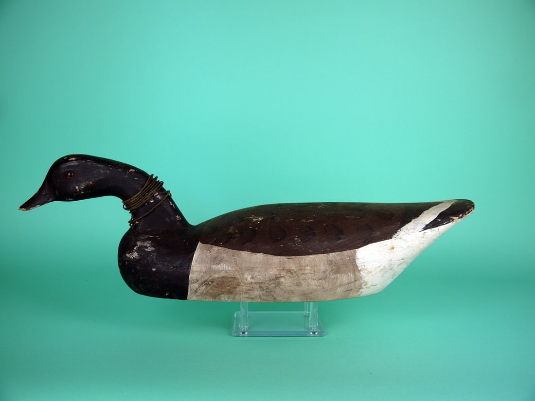 BRANT. C. WILBER: BRANT by Charles "Pete" Wilber, Island Heights, NJ. Original paint with overall in-use wear. Good structural condition with 3/4" chip to underside of the bill. Hollow construction. Swimming model.