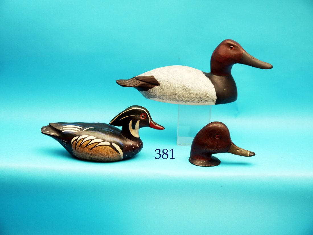 ONE-HALF SIZE CANVASBACK DRAKE by Gary Daisey,: ONE-HALF SIZE CANVASBACK DRAKE by Gary Daisey, Chincoteague, VA. Together with a ONE-HALF SIZE WOOD DUCK by Charles Moore. Also a cast iron RINGBILL PAPERWEIGHT. All in excellent original paint and co