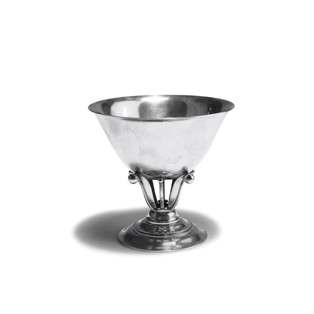 Small footed '17A' bowl, c1915.: H. 10.5 cm, D. 11 cm. Designed by Johan Rohde. Made past 1945. Silver. Marked: DESSIN JR (beads), DENMARK, GEORG JENSEN (beads), STERLING, 17A.