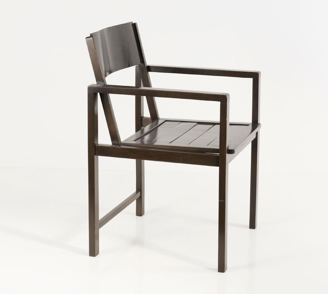 Armchair, c1928: Erich Dieckmann, H. 80 x 53 x 53 cm. Made by Hausrat GmbH, Frankfurt am Main (attributed). Beech, beech ply, stained dark.