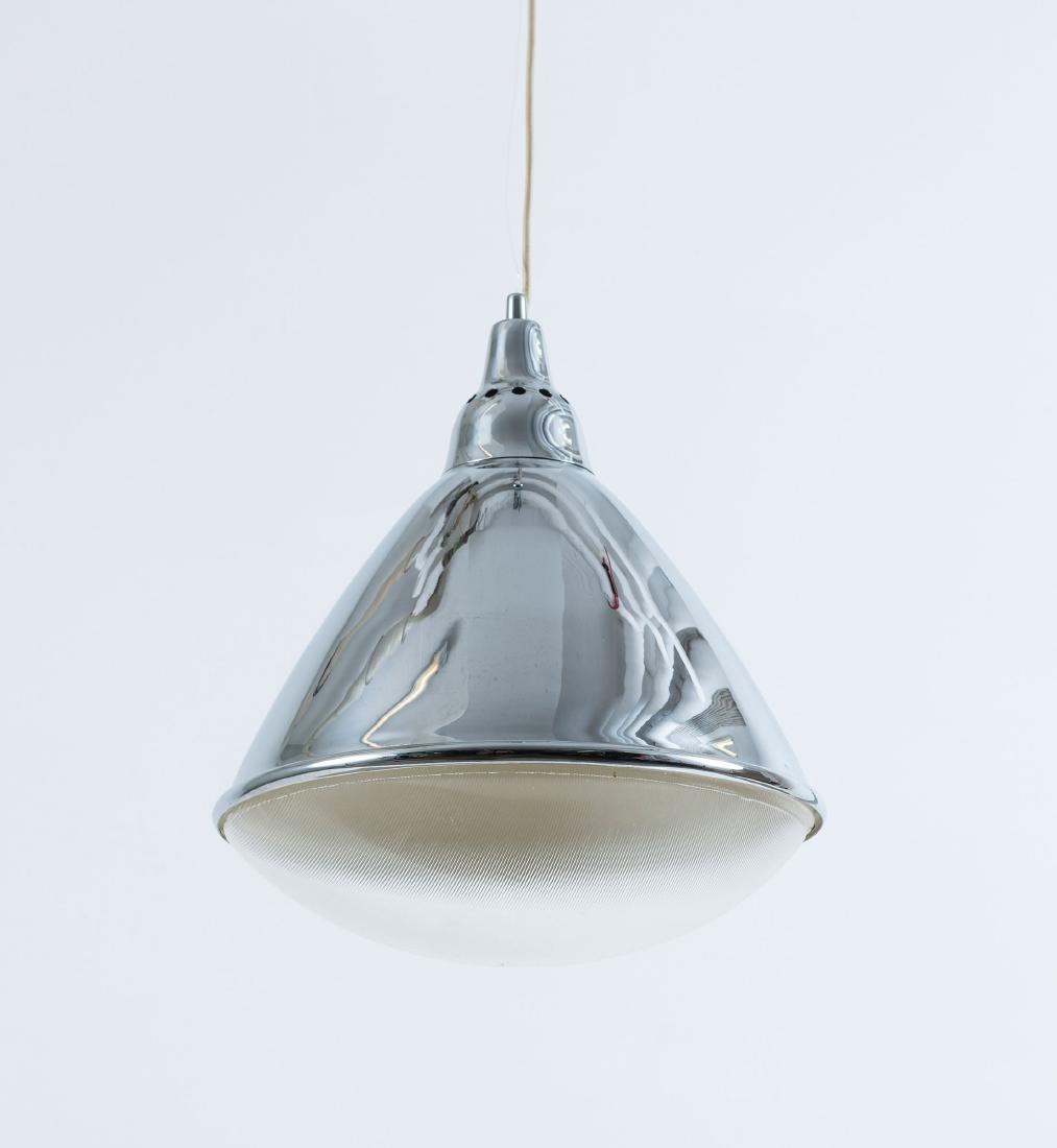 'Headlight' pendant light, 1968: Ingo Maurer, H. 42.5 cm, D. 39 cm. Made by Design M Ingo Maurer, Munich. Chrome-plated sheet steel, clear plastic.