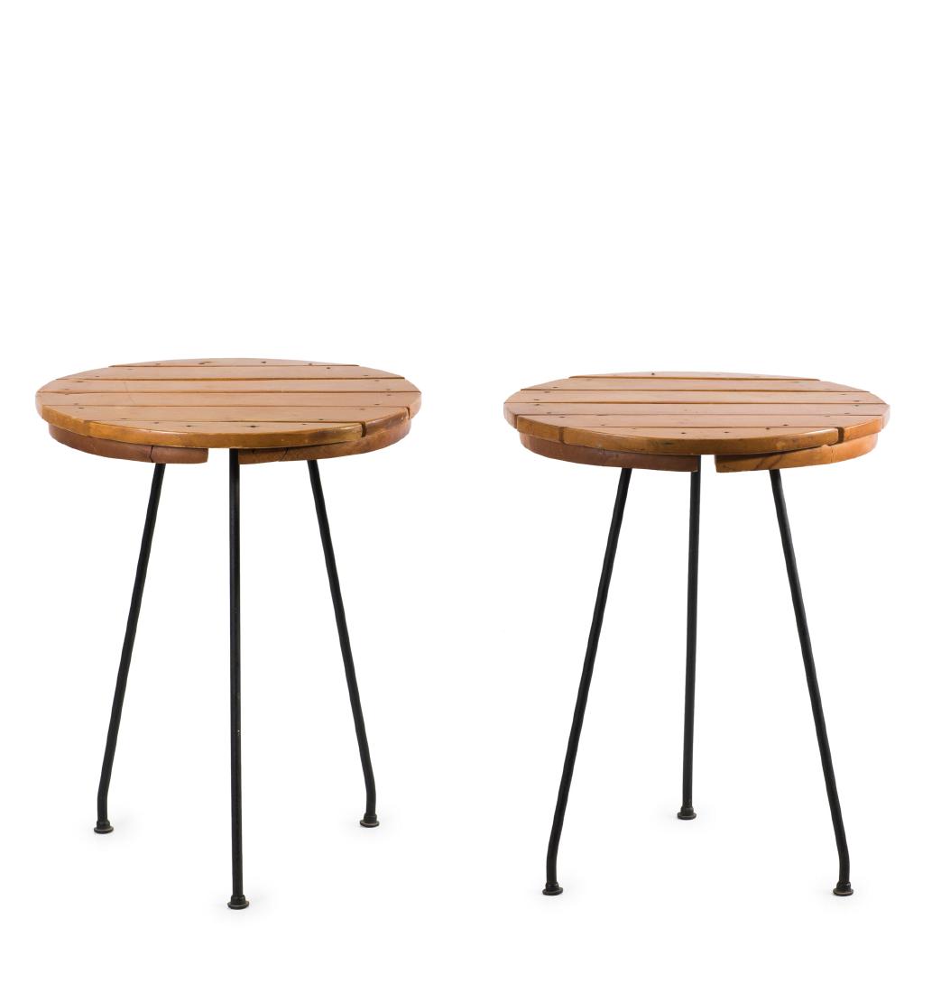 Pair of side tables, 1950s: Arthur Umanoff, H. 57 cm, D. 45.5 cm. Made by Raymor, New York. Fruit wood, steel rods, painted black.