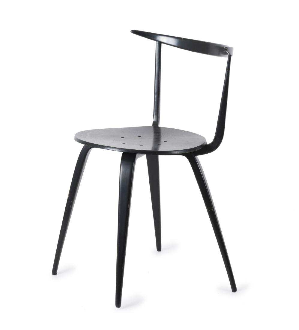 'Pretzel chair', 1952: George Nelson , H. 76 x 50 x 49 cm. Made by Vitra, Weil am Rhein (attributed). Ply, painted black.