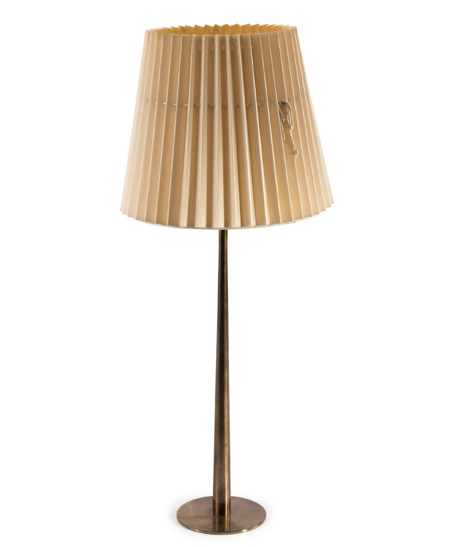 'B-66' table light, c1960: Hans-Agne Jakobsson, H. 86 cm, D. 34 cm. Made by Hans-Agne Jakobsson AB, Markaryd. Sheet brass, tubular brass, 'Le Klint' fabric shade. Marked: HAJ MARKARYD, B-66.