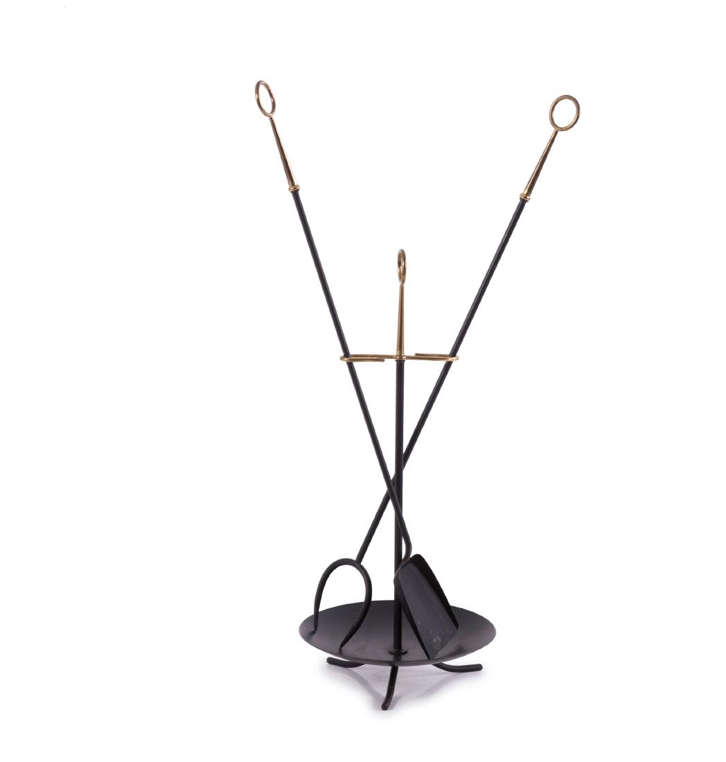Fireplace companion, 1950s: Gunnar Ander, 3 pieces. H. 50.5 cm; L. 68.5 cm. Made by Ystad Metall, Ystad. Sheet metal, tubular metal, black, tubular brass.