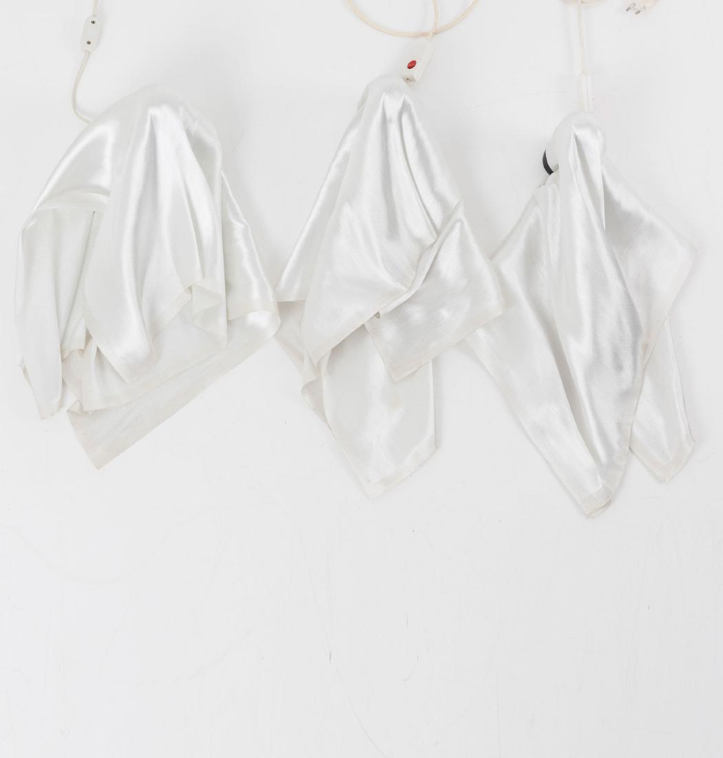 'Delight' wall light, 1980: Frans van Nieuwenborg; Martijn Wegmann, L. 57.5 cm. Made by Design M Ingo Maurer, Munich. Glass mesh, black plastic. Marked: Maker's label.