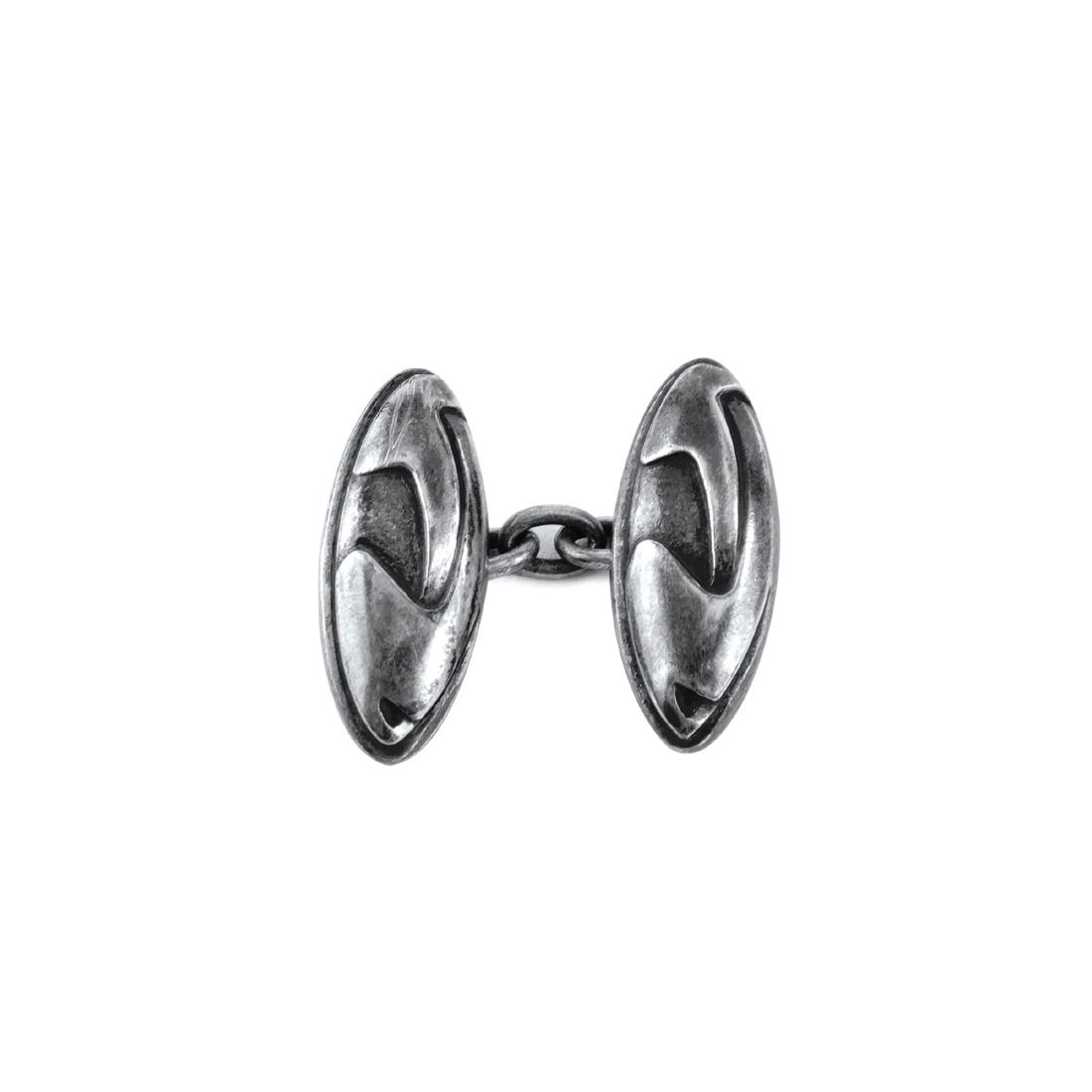 Chained buttons, c1904: Henry van de Velde, 2.3 x 1 cm. Made by Theodor Müller, Weimar. Silver, textured pattern. Marked: 900 (faint).