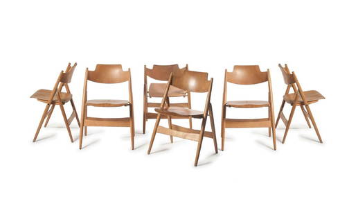 Six 'SE 18' folding chairs, 1953: Egon Eiermann, H. 76.5 x 54 x 50 cm. Made by Wilde & Spieth, Esslingen. Beech, beech ply.