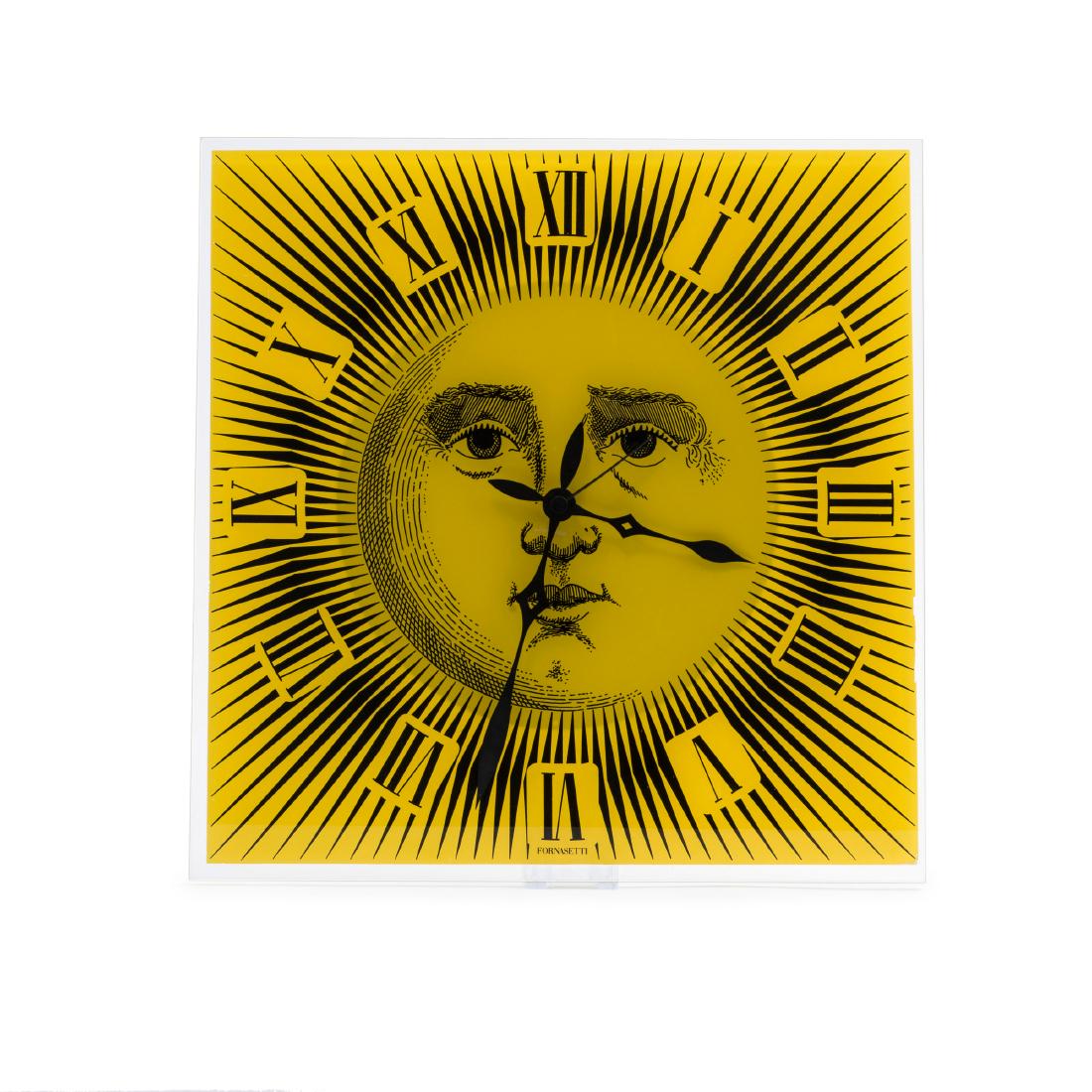 'Sole' clock, 1990s: Barnaba Fornasetti, 44 x 44 cm. Made by Fornasetti, Milan. Glass, coated with foil, yellow and black. Marked: FORNASETTI.