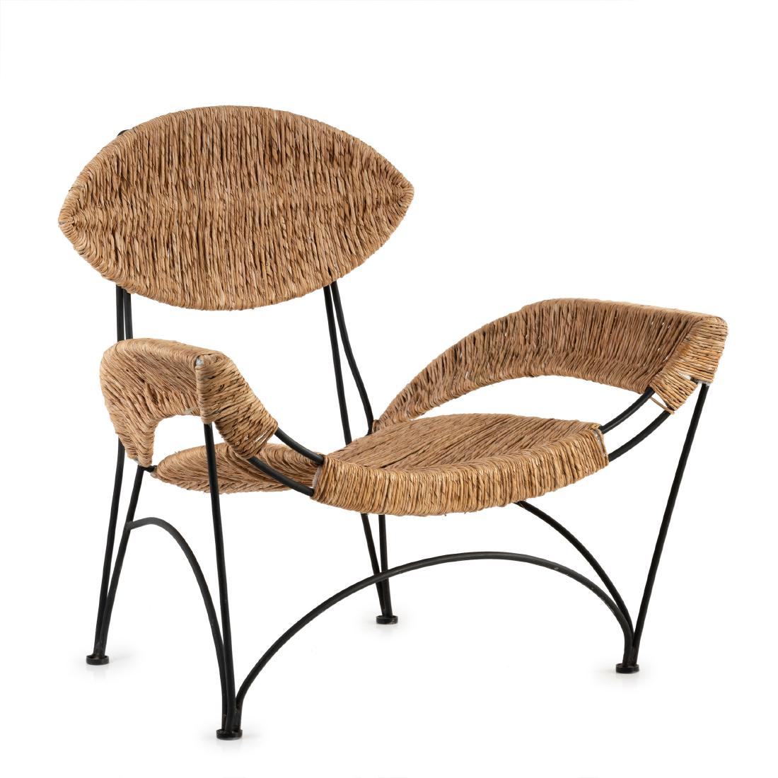 'Banana chair', 1988: Tom Dixon , H. 9ÃŸ x 94 x 73 cm. Made by Cappellini, Milan. Metal rods, painted anthracite grey, reedwork.