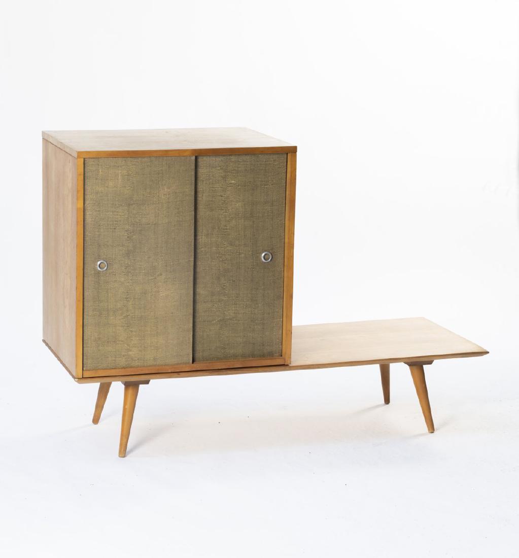 Bench w/ storage unit, c. 1955: Paul McCobb, H. 85 x 61 x 46 cm; Cabinet: H. 60.5 x 61 x 46 cm; Bench: H. 24.5 x 122 x 46 cm. Made by Planner Group, Winchendon. Birchwood, beechwood and beech ply, vinyl meshwork Marked: Manufacturer