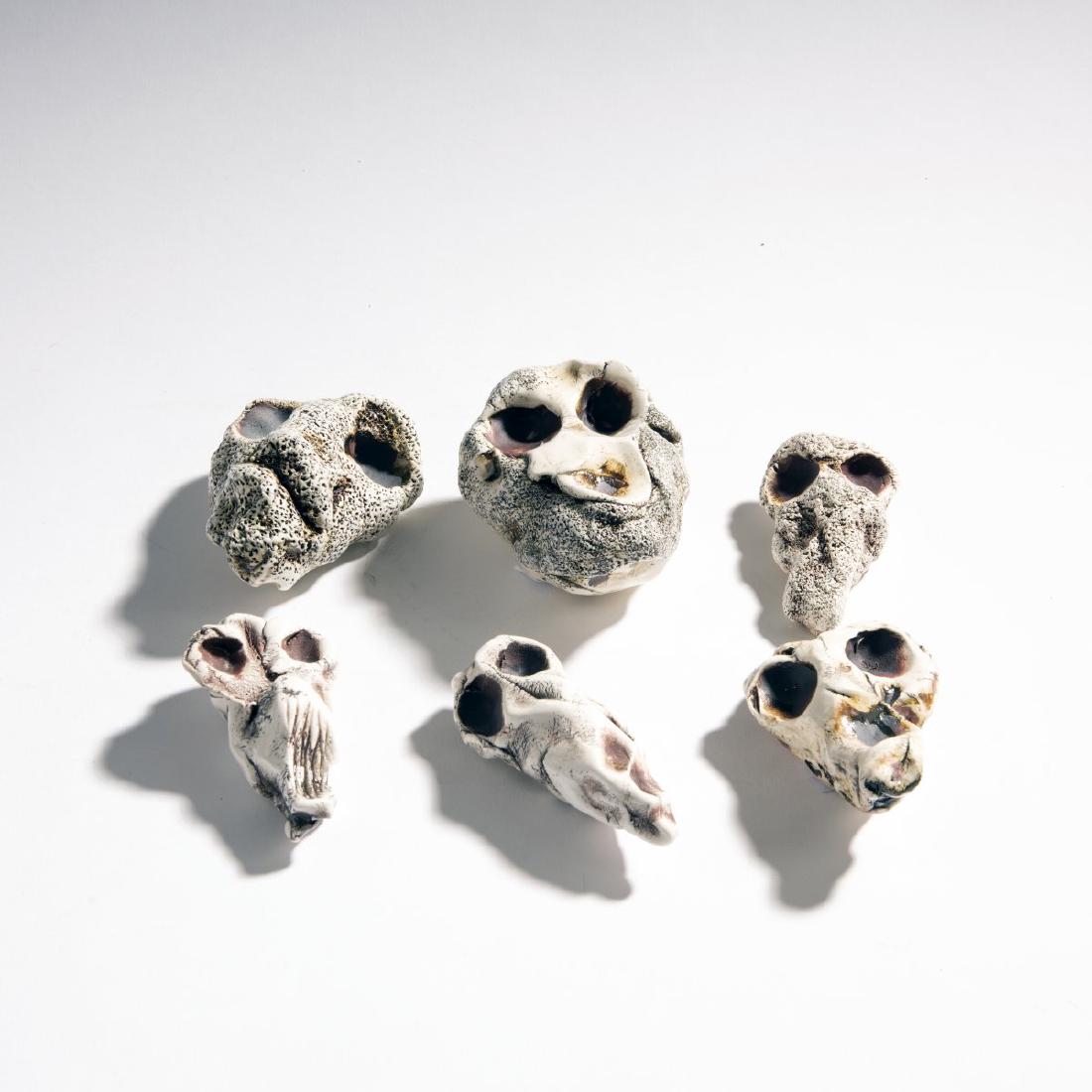 Michele Oka Doner, Six 'soul catcher' objects, c.: Michele Oka Doner, H. 9 x 5,4 cm; 9,5 x 5,5 cm; 9,5 x 6,5 cm; 10,5 x 4,4 cm; 10,9 x 7,6 cm; 10,9 x 8,4 cm.Made by KPM Nymphenburg. Porcelain, white, matt brown glazed. Marked: manufacture label, OKA (