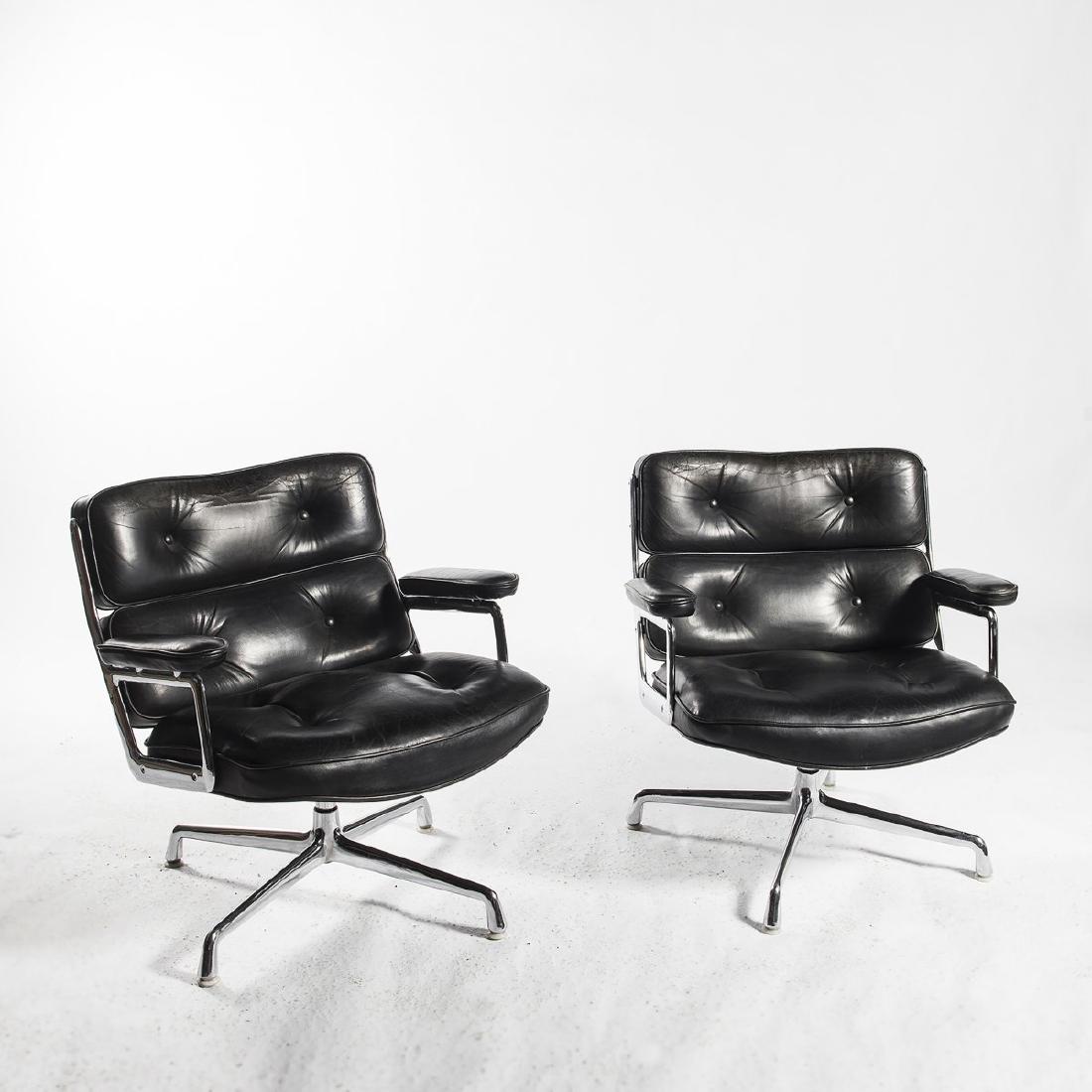 Charles Eames, Two 'Time-Life Executive' chairs, 1960: Charles Eames, H. 79 x 74 x 71.5 cm. Made by Herman Miller Inc., Zeeland, Mich. Cast aluminium, chrome plated, black leather.