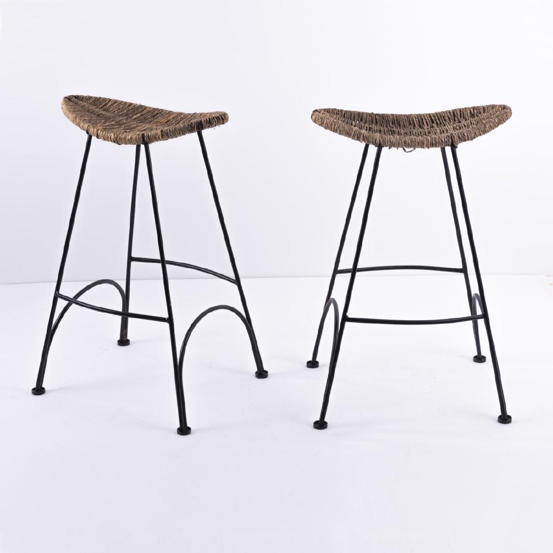 Tom Dixon, Two 'banana vhair' bar stools, 1992: Tom Dixon, H. 78,5 x 52 x 42 cm. Made by Cappellini, Milan. Tubular metal, lacquered black, reed.