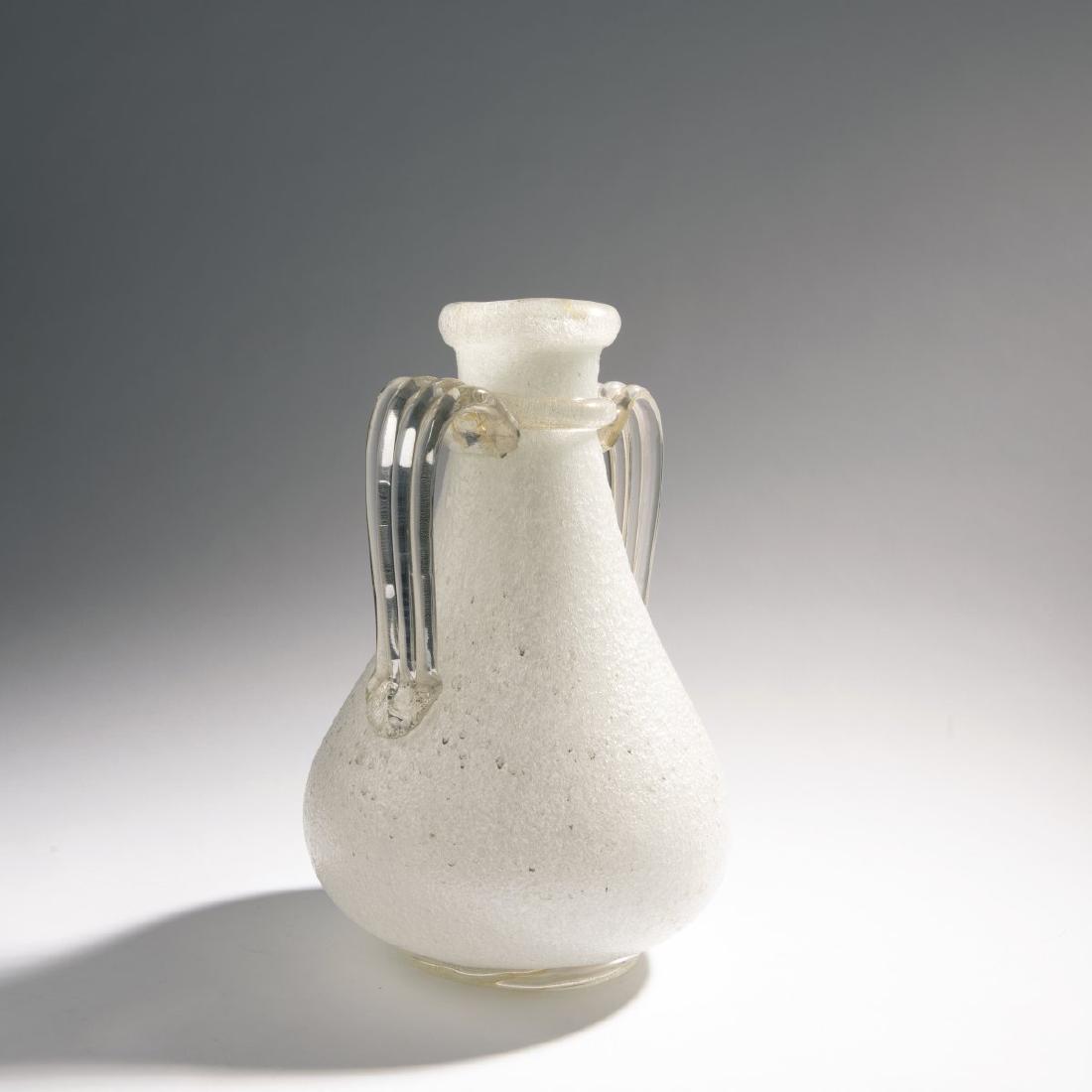 Ercole Barovier, 'Pulegoso' handles vase, c. 1930: Ercole Barovier, H. 40 cm. Made by Barovier & C. Clear foam glass. Base, handles and rim clear with burst gold foil. Signed on the base: maker€ label.