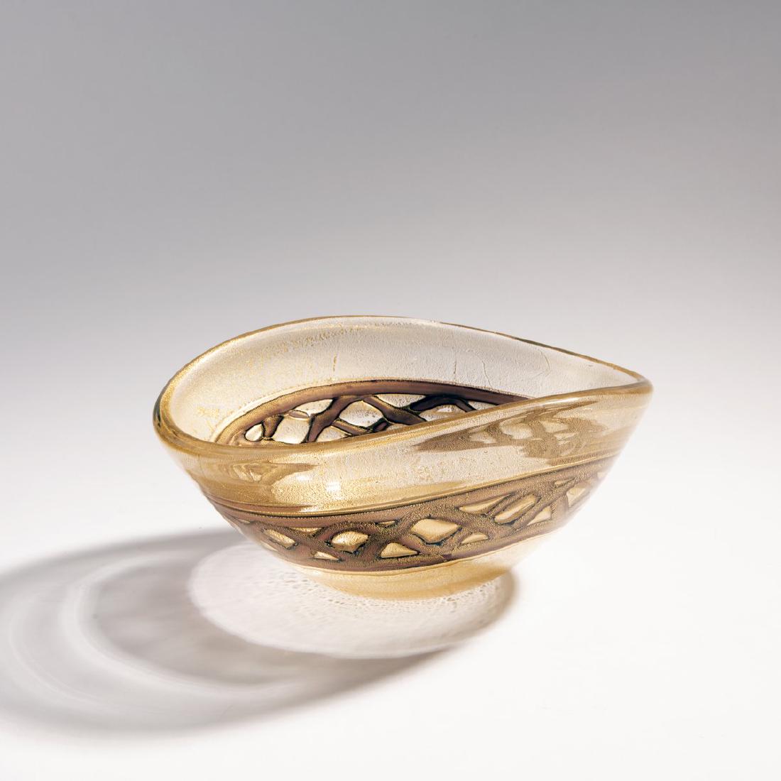 Ercole Barovier, 'Pezzo unico di prova' bowl, 1955-60: Ercole Barovier, H. 14 cm; 30,5 x 23 cm. Cased glass, clear with burst gold foil and violet ribbons. Signed on the base: maker€ label.