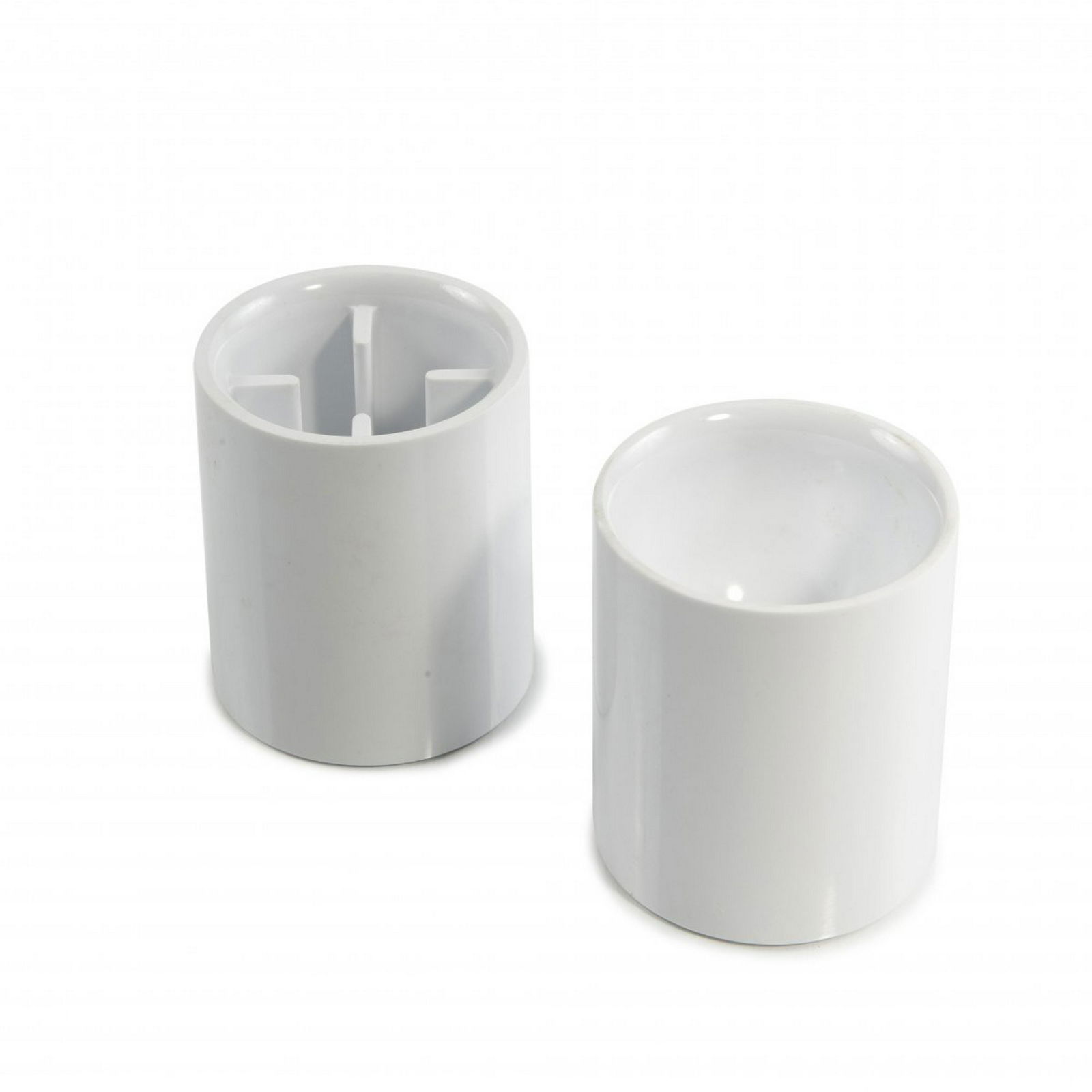 Enzo Mari, Pair of 'Hawaii' egg cups, 1972: Enzo Mari, Pair of 'Hawaii' egg cups, 1972, H. 6.5 cm, D. 5.5 cm. Model 3099A. Made by Danese, Milan. Melamine for foods, white. Reversed use as a candlestand. Marked: Maker's mark., Cat. Danese Milan