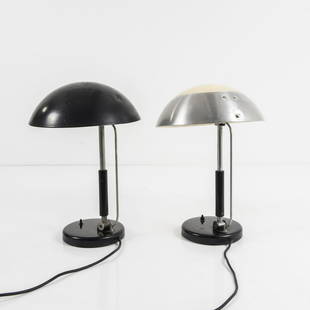 Karl Trabert, Two table lights, c. 1930: Karl Trabert, Two table lights, c. 1930, H. 44.5 cm; D. 32.5 cm; H. 44.5 cm, D. 33 cm. Made by Schanzenbach & Co., Frankfurt. Cast iron, sheet metal, painted black, sheet aluminium, tubular