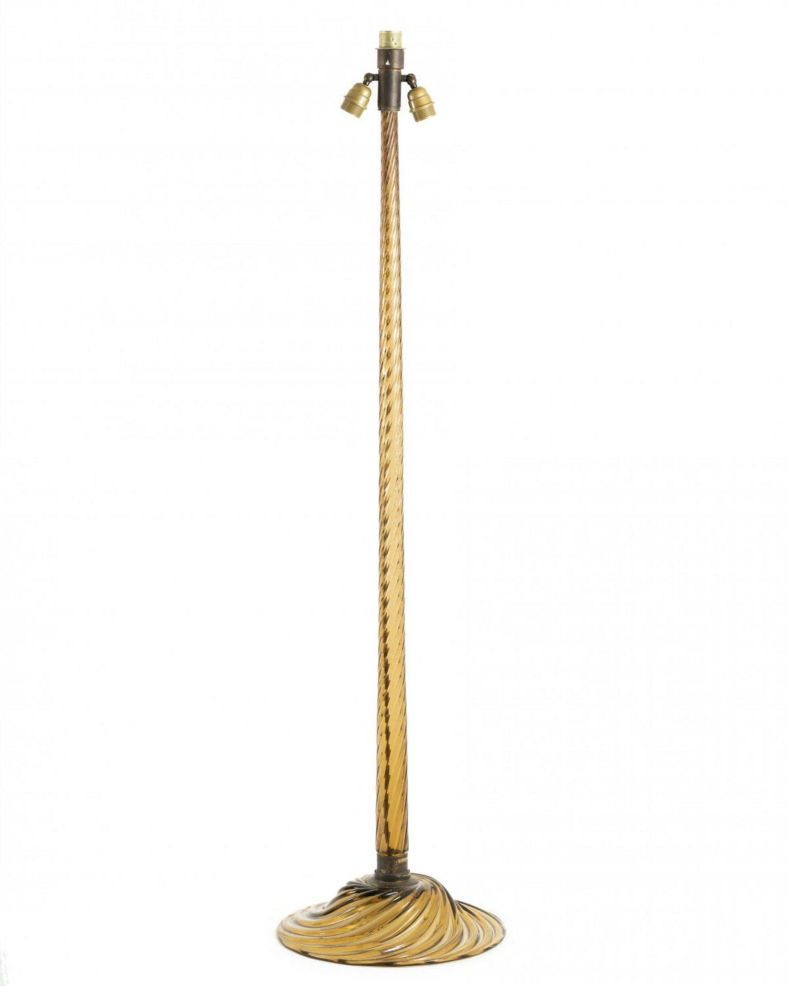 Venini & C., Murano (attr.), Floor lamp, c. 1950: Venini & C., Murano (attr.), Floor lamp, c. 1950, H. 156 cm. Amber colored glass in diagonal rib optics, brass mounting.,