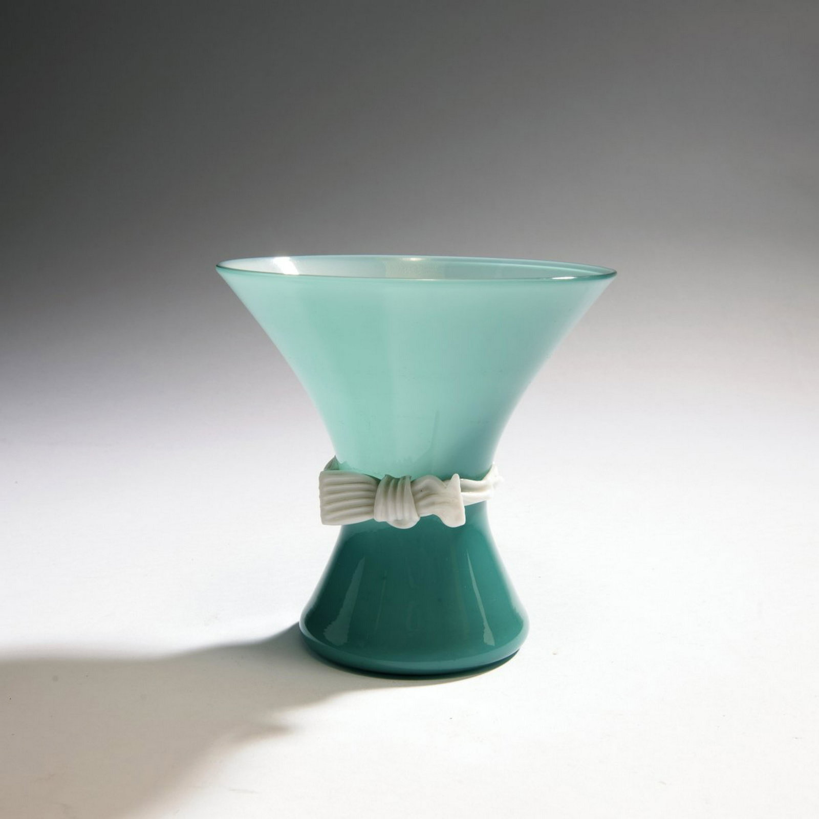 Paolo Venini, 'Opalino' vase, 1952: Paolo Venini, 'Opalino' vase, 1952, H. 14.5 cm. Execution: Venini & C. Cased glass, colorless, white and turquoise blue, band in white glass mass. Signed: venini murano ITALY (round acid stamp)., Cf. 