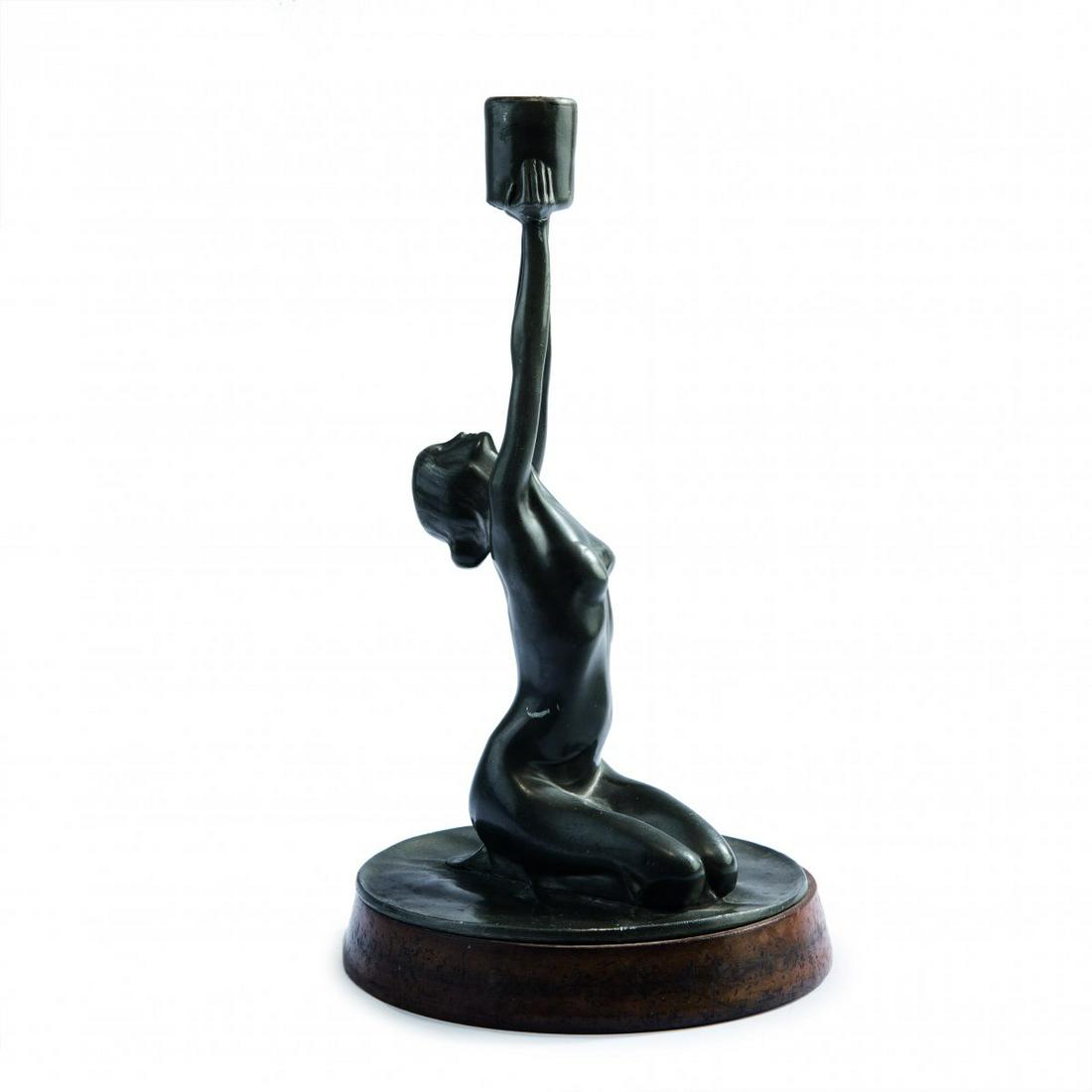 Franz Metzner, Candlestick, c. 1905: Franz Metzner, Candlestick, c. 1905, H. 27.5 cm (total). Cast metal, dark patina, mounted on a wooden base. Unsigned. ,
