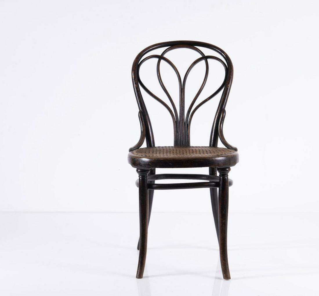 Michael Thonet, Chair '25', 1865: Michael Thonet, Chair '25', 1865, H. 89.5 x 57 x 43 cm. Made by Thonet, Vienna. Beech, lacquered dark brown, bent; cane work. Marked: paper trademark label, THONET (hardly visible)., Ostergard, Bent W