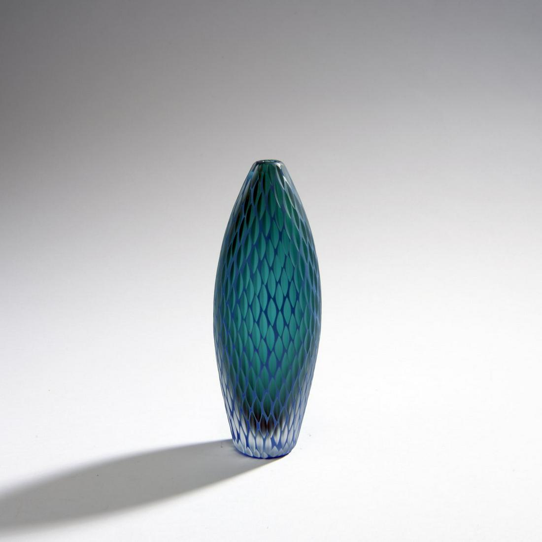 Monica Guggisberg and Philip Baldwin, Vase, 1999: Monica Guggisberg and Philip Baldwin, Vase, 1999, H. 20 cm. Execution: Venini & C. Cased glass, clear and green with opaque blue layer; honeycomb cut on the surface. Signed on the bottom: venini99 (en
