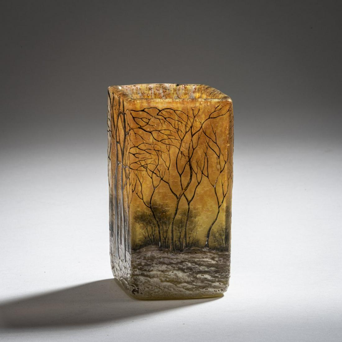 Daum Frères, Vase 'Crépuscule neige', c.: Daum Frères, Nancy, Vase 'Crépuscule neige' or 'Paysage d'hiver', c. 1902, H. 11.4 cm. Cased glass, clear, lemon yellow in the lower area, orange powder inclusions in the upper area, etc