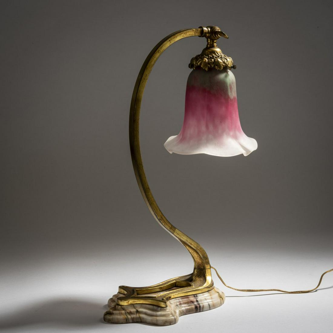 Daum Frères, Nancy, Table light, c. 1910: Daum Frères, Nancy, Table light, c. 1910, H. 42 cm. Lampshade in clear glass with green and raspberry red powder inclusions. Signed: Daum Nancy, cross of Lorraine (engraved). Brass foot on marb