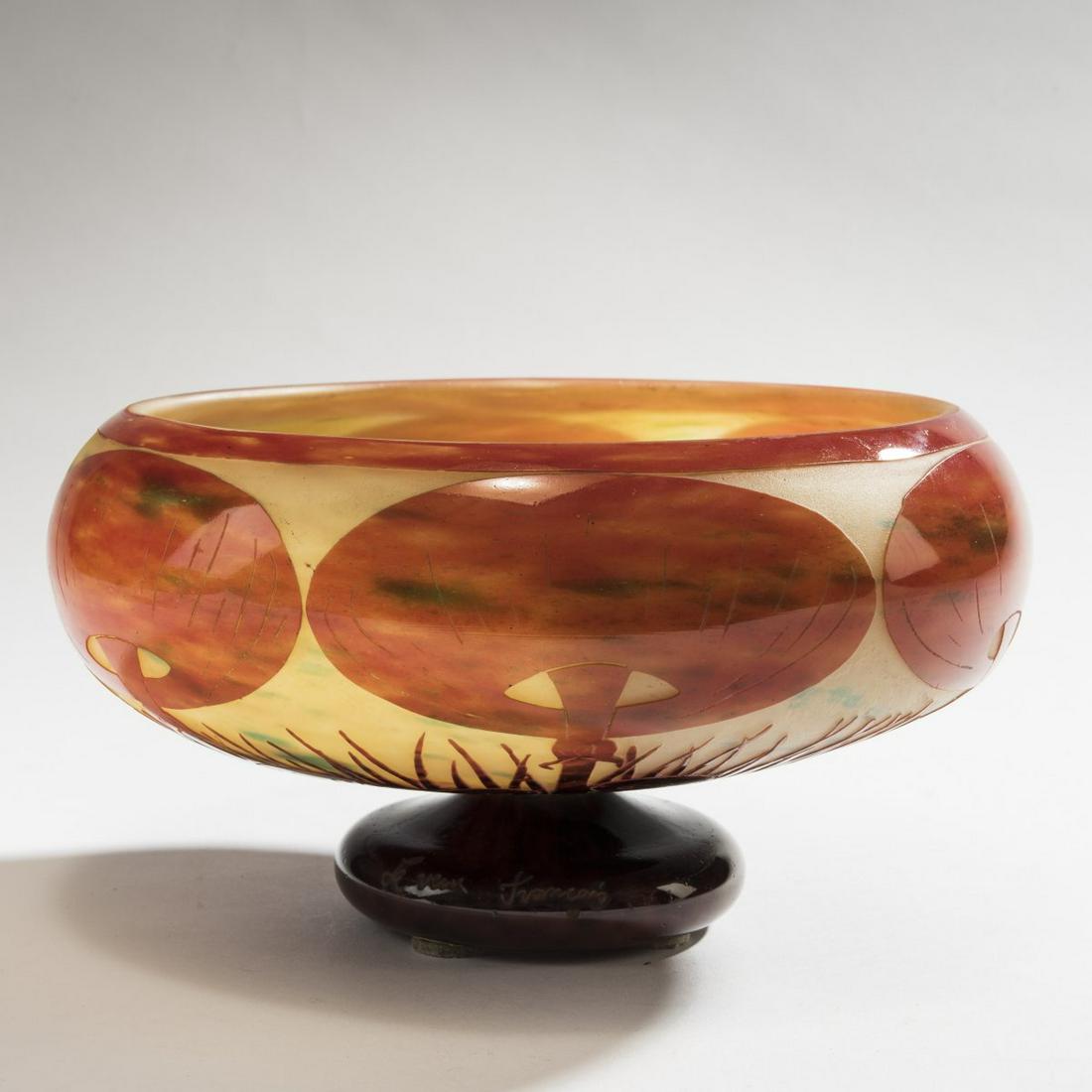 Schneider, 'Coprins' foot bowl, 1923-26: Schneider, Epinay-sur-Seine, 'Coprins' foot bowl, 1923-26, H. 13 cm, D. 24.5 cm. Cameo glass, clear, with lemon yellow and green powder inclusions, seal red and dark purple enamel fusions. Decorated w
