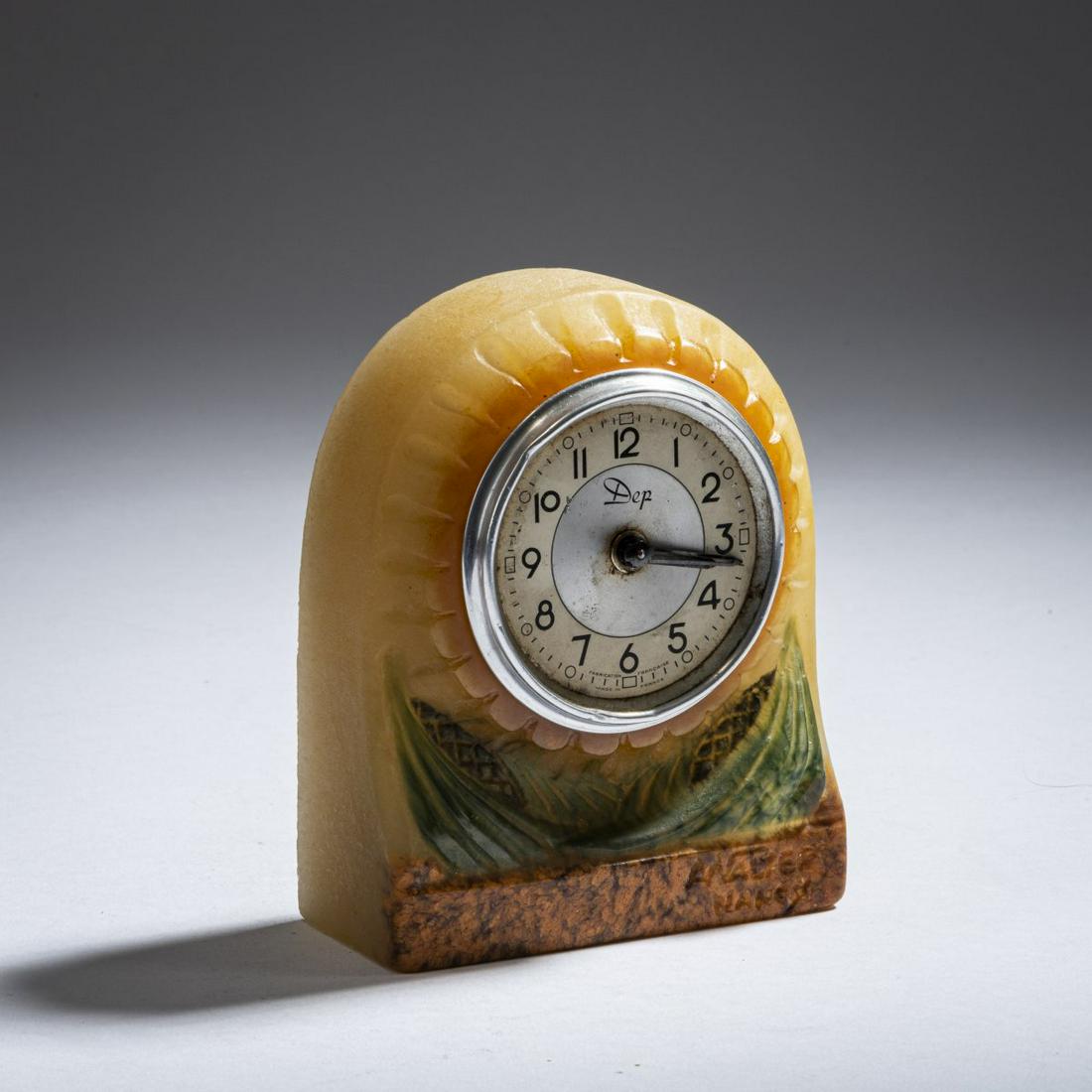 Amalric Walter, Nancy, Table clock, c. 1925-30: Amalric Walter, Nancy, Table clock, c. 1925-30, H. 10.7 cm. Pâte de verre, translucent glass gather, melted, predominantly honey yellow, front with orange, green and brown-marbled powder fusions