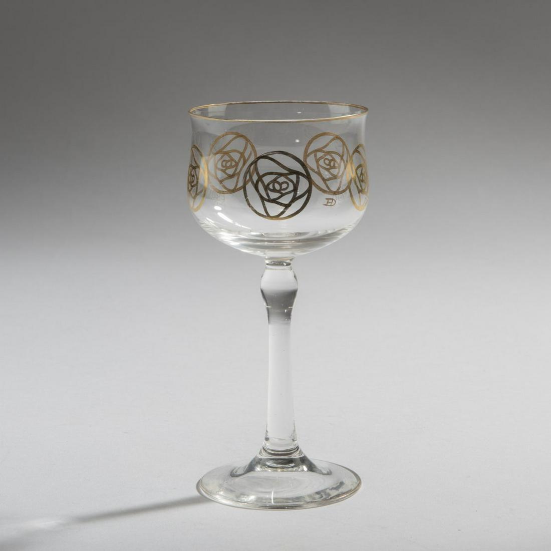 Hans Christiansen, Wine glass 'Golden Rose' c1903: Hans Christiansen, Wine glass 'Golden Rose', c. 1903, H. 16 cm. Made by Theresienthal. Clear glass, dome all around with gold decoration., Höltl (publ.), Das Böhmische Glas, Passau 1995, vol