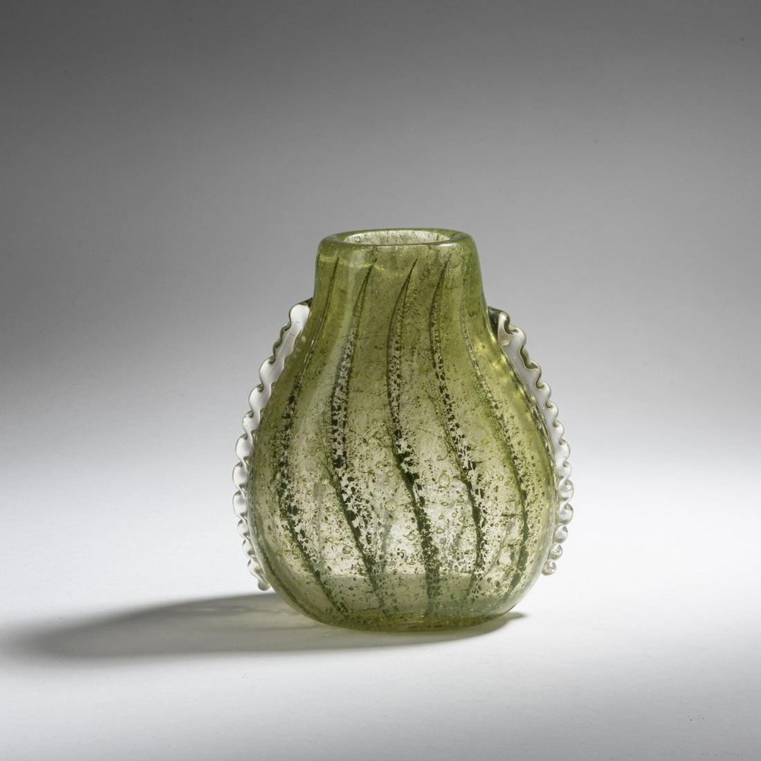 Ercole Barovier, 'Gemmato' vase, c. 1936: Ercole Barovier, 'Gemmato' vase, c. 1936, H. 17.7 cm. Clear glass with fused oxides in green, optical grooves and two fused, wavy handles.,
