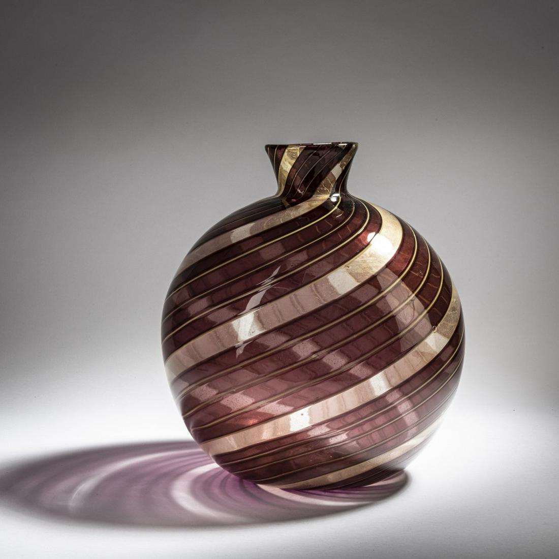 Ercole Barovier, 'Striato' vase, 1954: Ercole Barovier, 'Striato' vase, 1954, H. 33 cm. Execution: Barovier & Toso. Clear glass with fused bands in violet, finely burst gold foil and narrow threads made of yellow glass. Signed on the b