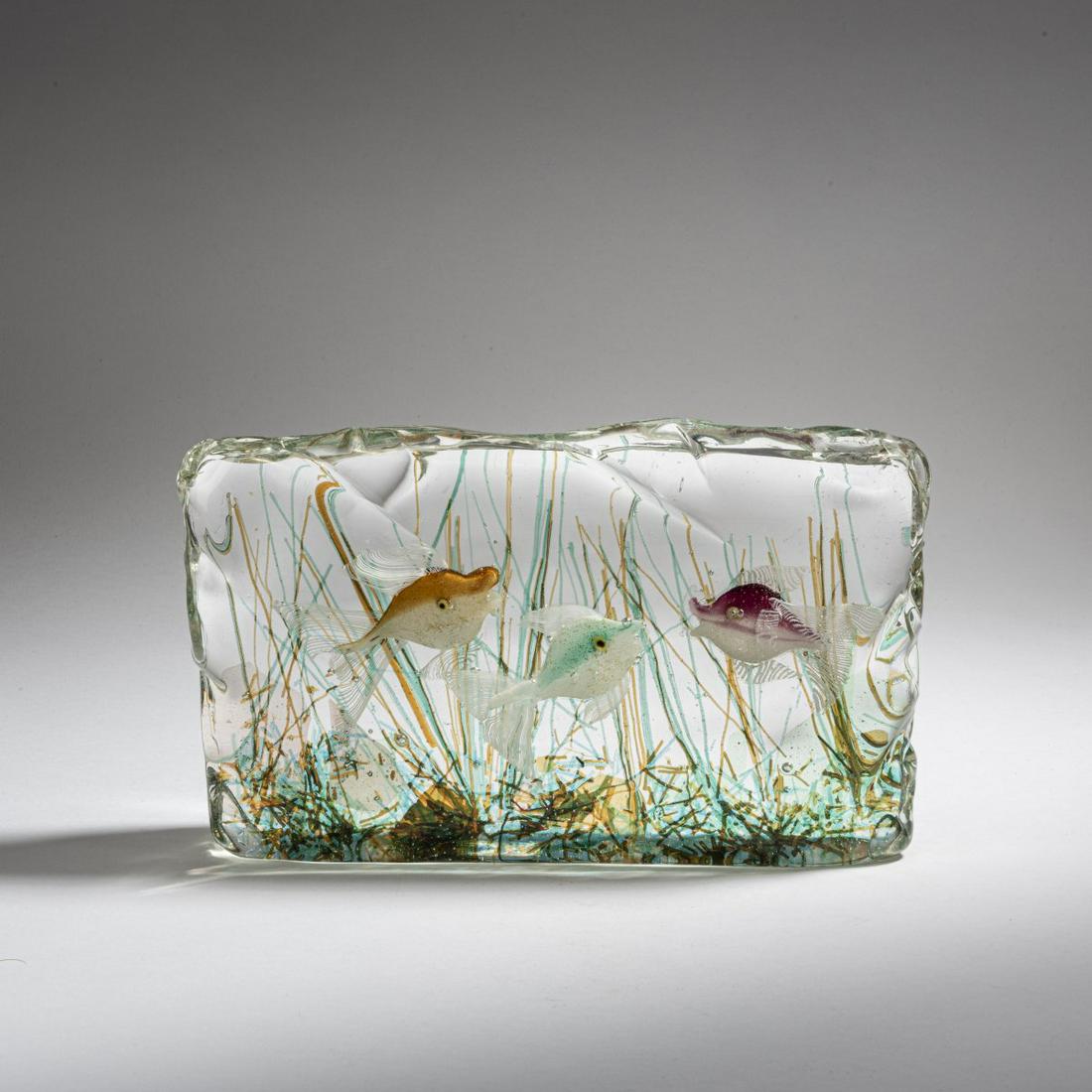 Gino Cenedese, Aquarium, c. 1960: Gino Cenedese, Aquarium, c. 1960, With three fish. H. 15.5 cm; 5 x 26.5 cm. Clear glass block with multi-colored seals.,