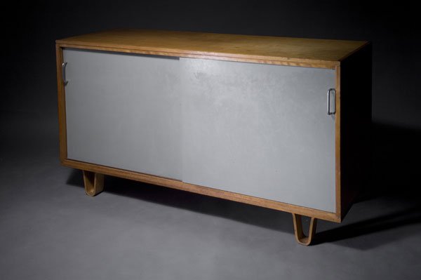 Cees Braakman. Small 'D B01 sideboard, designed c: Cees Braakman. Small 'D B01 sideboard, designed c. 1950. H. 79 x 131 x 49.5 cm. Made by UMS Pastoe, Utrecht, in the 1950s. Wood, birch veneer, sliding-doors painted grey-blue. Handles replaced.
