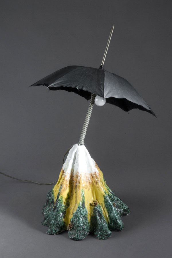 UFO (Lapo Binazzi). 'Paramount' table light, desi: UFO (Lapo Binazzi). 'Paramount' table light, designed in 1979. H. 79 cm; diameter 53 cm. Made by Alchimia, Milan. Faience, white, brown, yellow green and red, umbrella with black tissue.