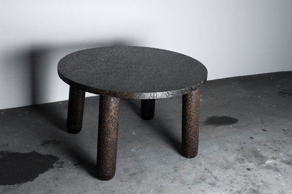 Marcel Wanders. 'Flower' table, designed in 2001.: Marcel Wanders. 'Flower' table, designed in 2001. H. 74.5 cm; diameter 120 cm. Made by Moooi, Breda. Luan wood, brandished flower pattern. Wood cracked in places.