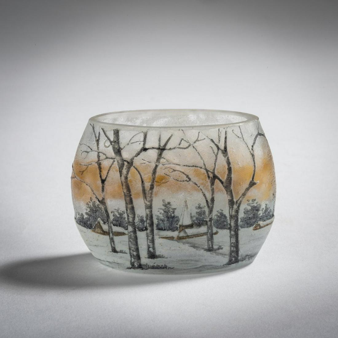 Daum Frères, Nancy, Miniature vase 'Paysage en: Daum Frères, Nancy, Miniature vase 'Paysage en hiver', c. 1910, H. 4.1 cm. Overlaid glass, clear, orange and milky opalescent powder inclusions. Etched, enamelled and decorated with black solde