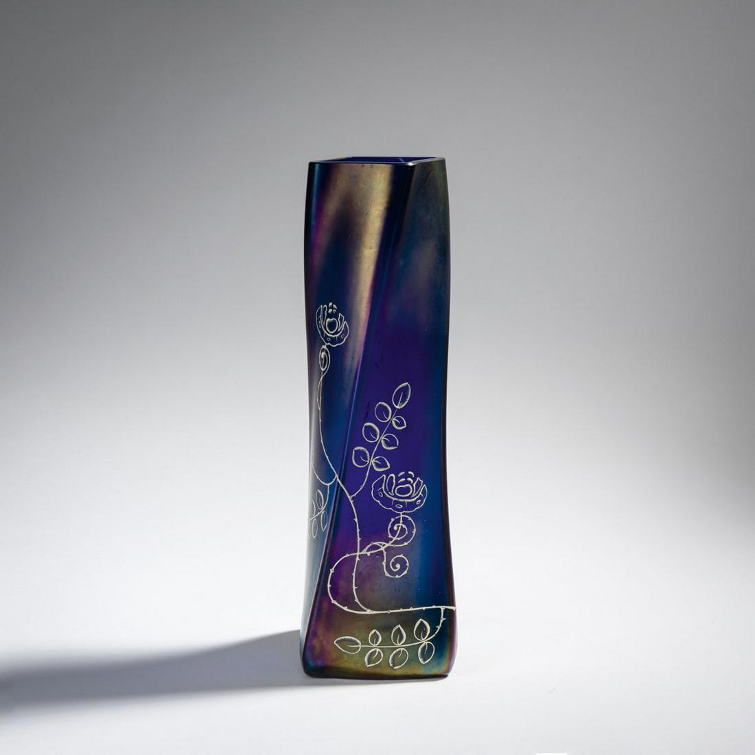 Ludwig Sütterlin, Vase, c. 1902: Ludwig Sütterlin, Vase, c. 1902, H. 31 cm. Made by Fritz Heckert, Petersdorf. Overlaid glass, clear and cobalt blue, iridescent; stylized decor with rose petals in white enamel., Zelasko, Fritz H