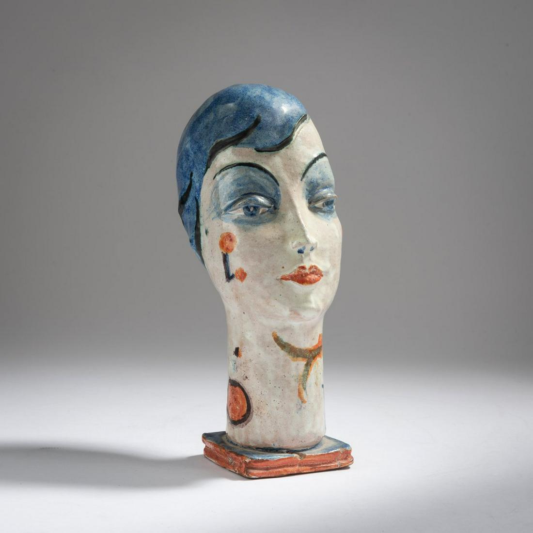 Gudrun Baudisch, Head, 1928: Gudrun Baudisch, Head, 1928, H. 24 cm. Made by Wiener Werkstätte. Majolica, glazed in blue, orange and black on white. Marked: WW, MADE IN AUSTRIA, artist's monogram GB, 407, 8 (embossed)., Schwe