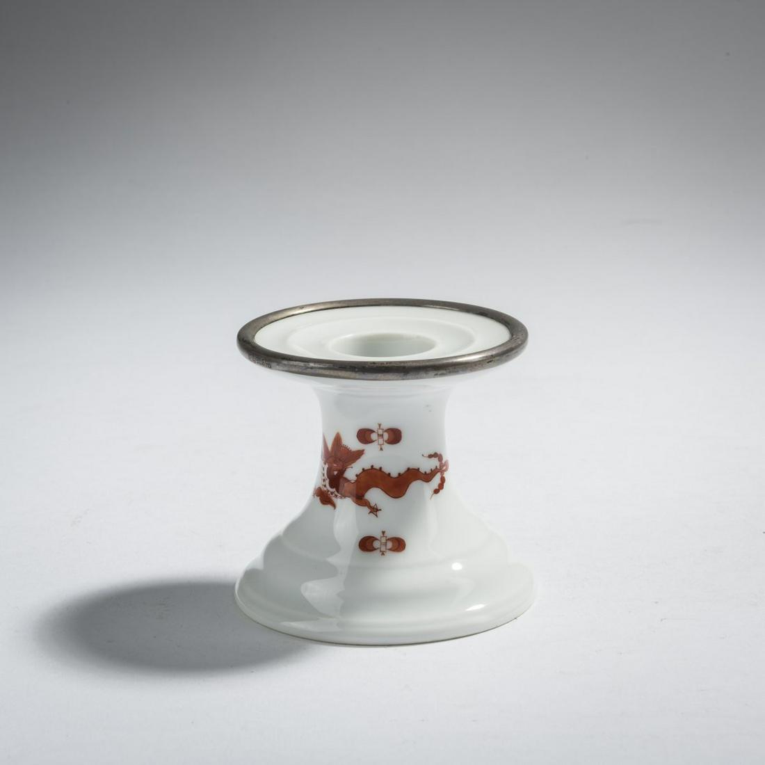 StPM Meissen, 'Coral Court Dragon' candlestick, 1924-33: StPM Meissen, 'Coral Court Dragon' candlestick, 1924-33, H. 6.1 cm. Design of the form around 1860. Design of the decor 'Coral Court Dragon' around 1730. Porcelain, white, glazed with cyclamen red ove