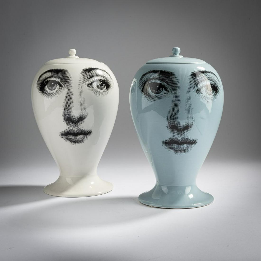 Piero Fornasetti; Barnaba Fornasetti, Two 'Buonanotte': Piero Fornasetti; Barnaba Fornasetti, Two 'Buonanotte' vases with lids, 2000s, H. 29.5 cm. Made by Bitossi, Montelupo for Fornasetti, Milan. Earthenware, glazed white and light blue with transfer deco